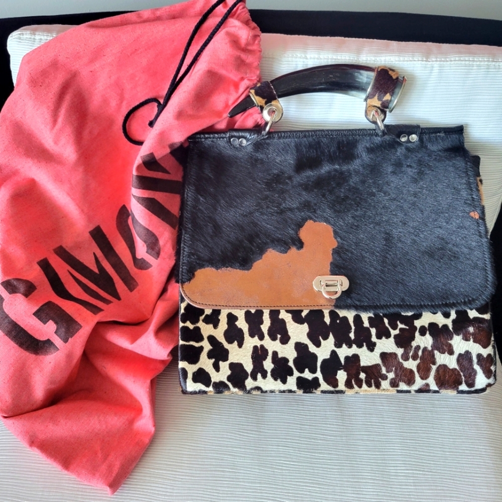 Genuine Gimoni designer pony hair handbag. Mint condition w/ original dust bag.